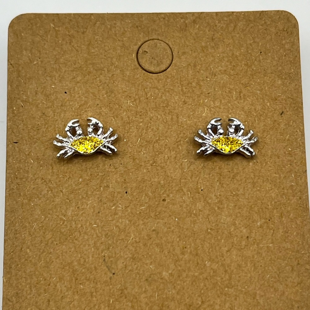 Shiny gold and silver stud crab earrings